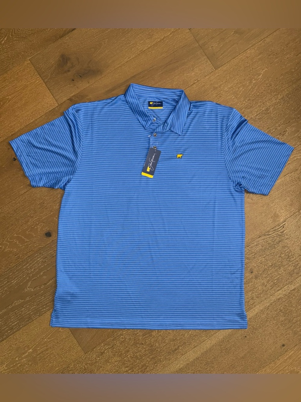 Men's Blue Striped Polo with Yellow Chest Emblem